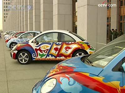 Colorful Olympic cars to go on auction block